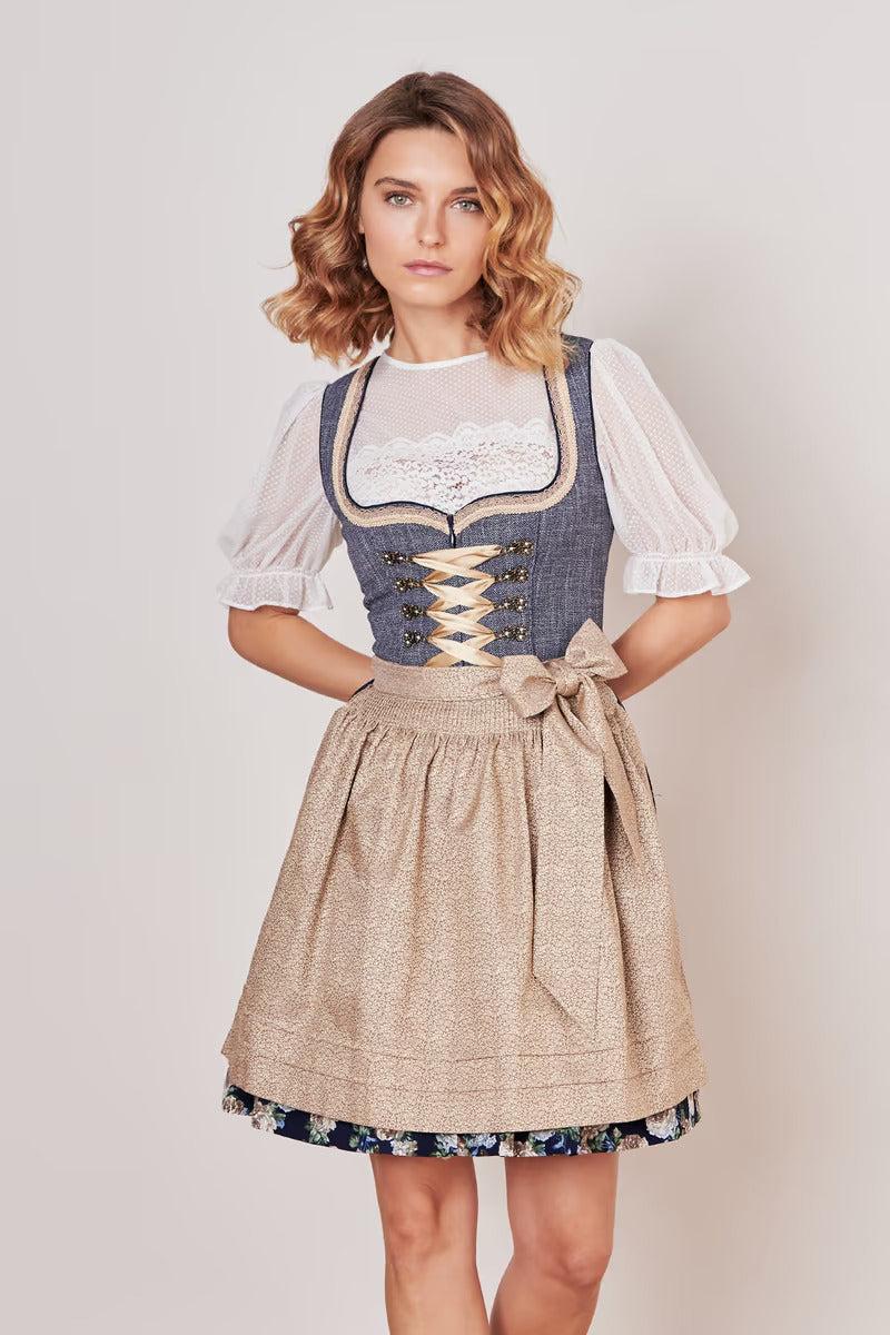 Kruger Mini Dirndl Justine in blue with heart-shaped neckline and floral skirt, featuring bodice lacing and two pockets.