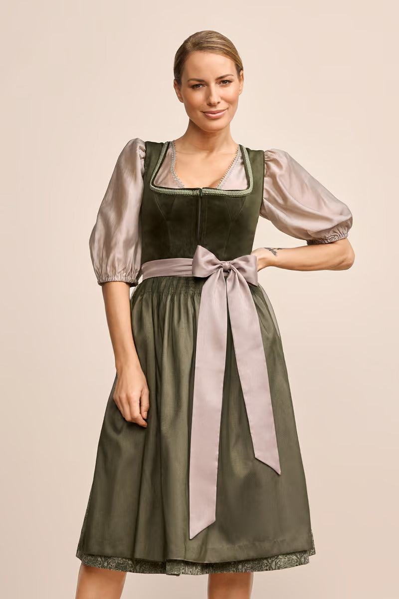 Kruger Long Dirndl Farine in green with velvet bodice and ornate patterned skirt.