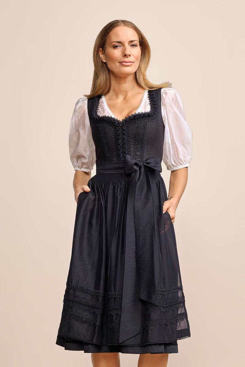Kruger Long Dirndl 2pcs. 70cm "Verity" in black, elegant design, tailored cut, subtle apron, below-knee length.