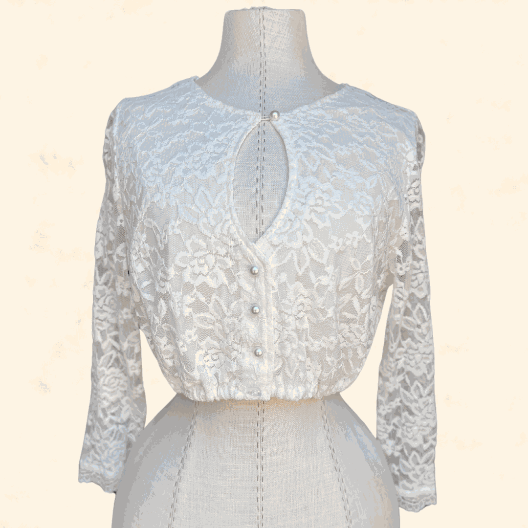 Ecru lace dirndl blouse by Kruger Collection, size 36, made from 100% polyester.
