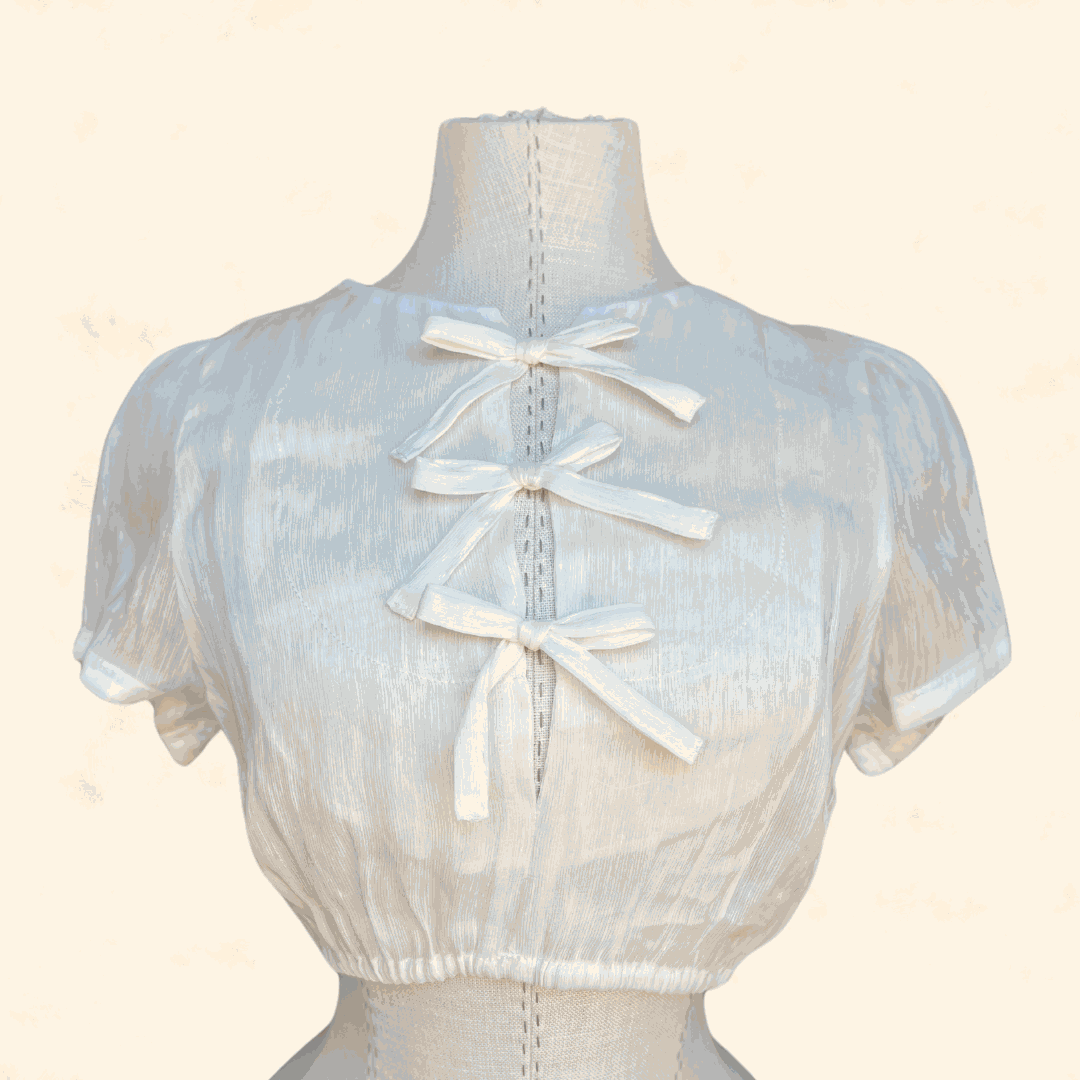 Ecru dirndl blouse from Kruger Collection, size 36, polyester material.
