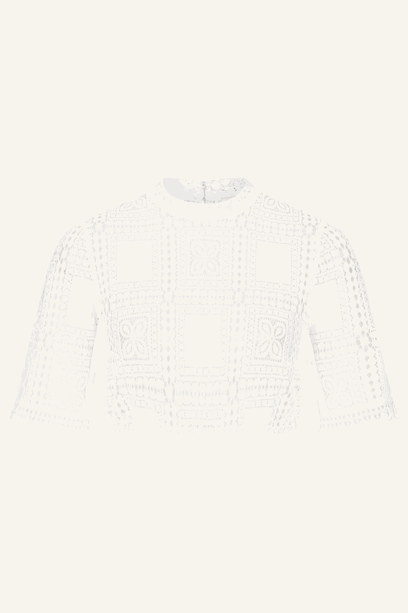 Kruger Dirndl Blouse "Larene" in ecru with lace pattern, short sleeves, and ruffled neckline.